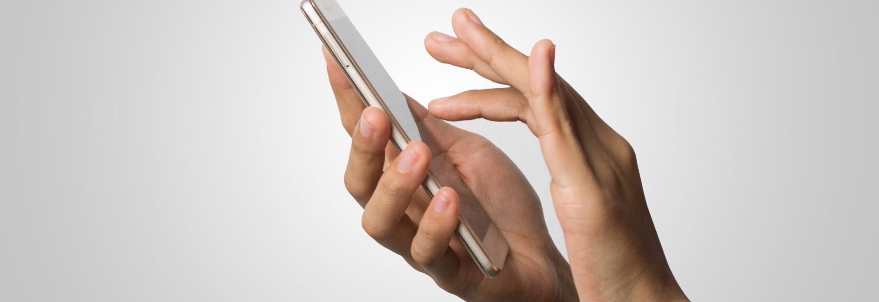 Woman Hand holding smart phone blank screen. Copy space. Hand holding smartphone isolated on white background.